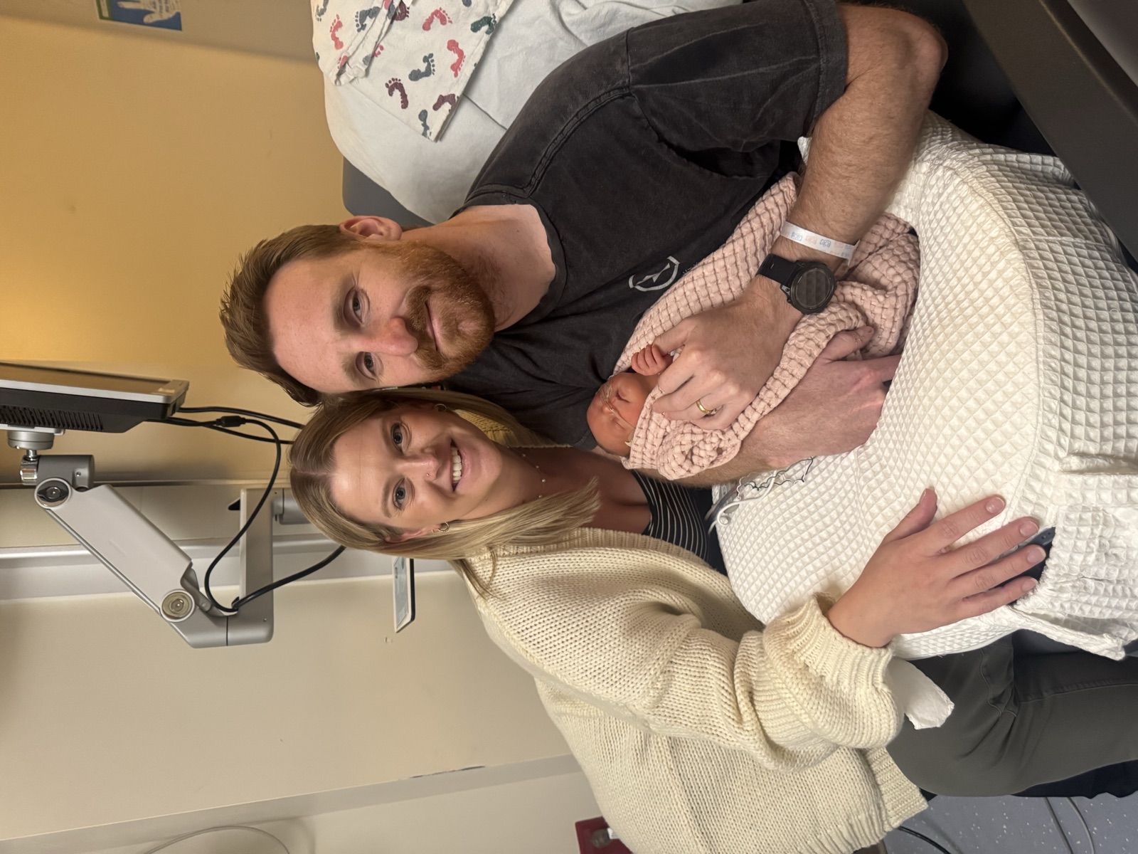 Allie and Tanner, founders of NestReady, with their daughter Nora